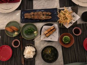 Fried inari sushi, wakame sushi, miso eggplant, yasai miso soup, grilled tofu skewer, kakiage tempura, goma dofu and simple rice. at Kuu Bali in Sanur
