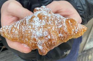 Vegan croissant 🥐 my first one in years! as you can see my partner got too excited and could not wait to take a bite 😂 at Dolce Capriccio Pasticceria in Oviedo