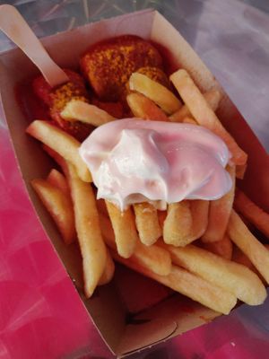 Currywurst with fries and mayonaise at Curry 61 in Berlin