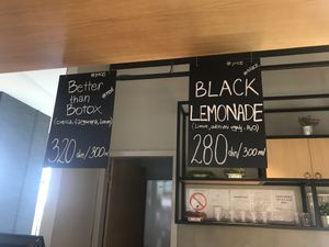 Beetroot, carrot,lemon juice. Lemon,activated charcoal, water at Artichoka in Belgrade