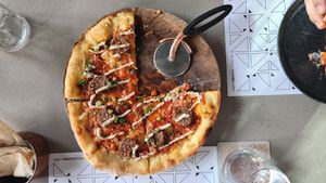 Chorizo meatball vegan pizza at Nomad Urban Eatery in Seef