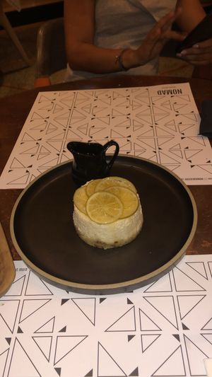 Vegan lemon cheesecake— not my favorite and do not recommend  at Nomad Urban Eatery in Seef