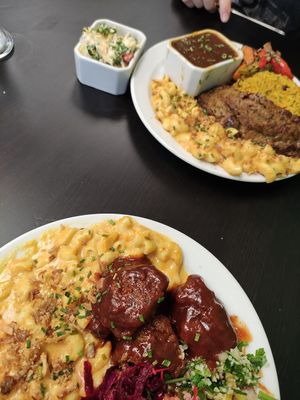 Jerk bites and mac and cheese (front) and sunday roast (back) at Earth's Kitchen  in Birmingham