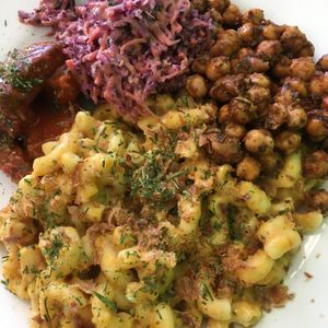 Mac and cheese, jerk bites and salad at Earth's Kitchen  in Birmingham