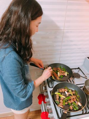 We cook together and eat sometimes!  at Helen's House in Seoul