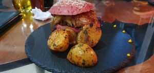 Vegan burger (plantain and almonds as a filling) - the potatoes were amazing! at Morphos in Monteverde