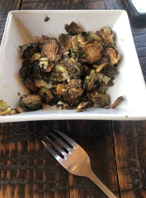 This was the small Brussels Sprouts, after we had already dug in.  Very good, but not crisp.  Lots of garlic. at Thirsty Barrel Taphouse & Grille in Grass Valley