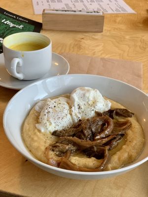 Polenta with eggs and mushrooms, golden milk  at Havana in Warsaw