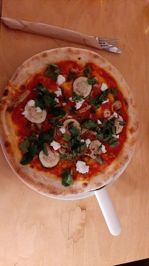 Pizza vegan feta, zucchini, marinated veggies at Havana in Warsaw