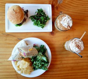 Burger, wrap and pumpkin spice latte with added cream at Plant Cafe & Kitchen - Itaewon in Seoul