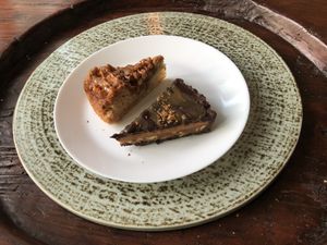 Apple cinnamon crumble & Snickers Caramel Tart brought from The Plant. Yum!  at Plant Cafe & Kitchen - Itaewon in Seoul