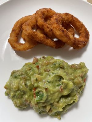 Onion rings and Guacamole. Order from home  at Plant Cafe & Kitchen - Itaewon in Seoul