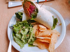 Wrap. I didn’t like that soggy plant-based ham? I don’t even know what it is... 랩이였는데.. 그 안에 들어있는 저 핑크색 축축한 건 무슨 식물성 대체  at Plant Cafe & Kitchen - Itaewon in Seoul