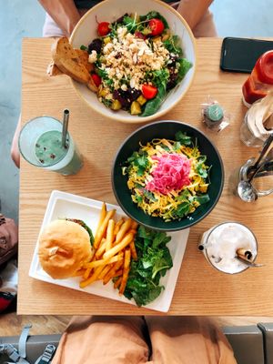 Our spread - plant cheese burger, veggie lentil bowl and sweet potato salad at Plant Cafe & Kitchen - Itaewon in Seoul