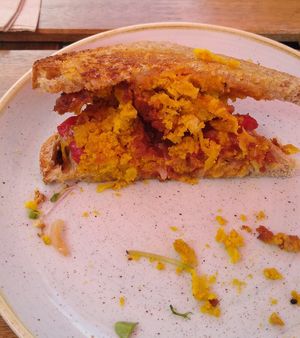 Onion Bhaji Sandwich on toasted sourdough at Grasshopper Cafe in Hope