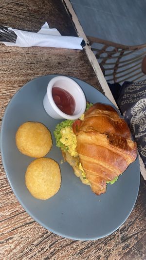 Breakfast croissant sandwich (egg salat, ham)  at The Sloth in Canggu