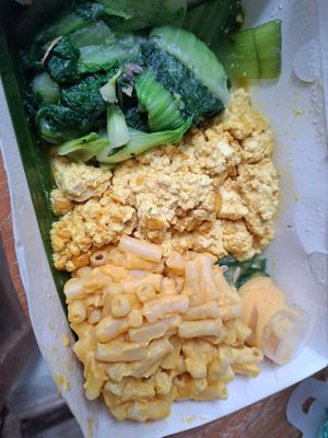 Custom combo (Mac and cheese, tofu scramble, bok choy, cucumber salad) at The Sloth in Canggu