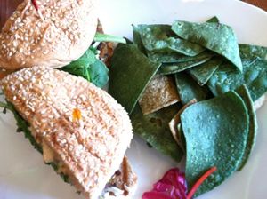 Golden Mean burger with tortilla chips. at Golden Mean in Santa Monica