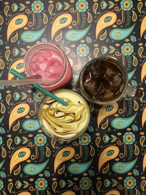 Clockwise from left: Fizzy happy Bandung ,sosro teh, avocado swirl gula Melaka at Warung Ijo in Central Singapore
