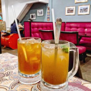 iced lemon tea and iced sour plum lime for 4.90sgd each.  at Warung Ijo in Central Singapore
