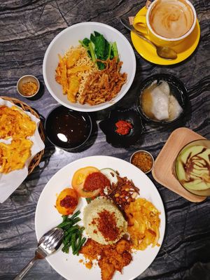 Ordered Bakmi Ayam, Nasi Lemak Fried Chicken, Avocoda juice in choco sauce (indo way is choco sauce! Can choose to go w gula melaka too), Veggie Fritters and a Latte for $37.10. at Warung Ijo in Central Singapore