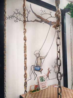 Nice Art and a different experience sitting on swing and eating your meal. at Warung Ijo in Central Singapore