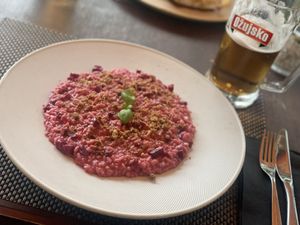 Beetroot risotto with pistachio crumb on top. Super tatsty  at Amfora in Dubrovnik