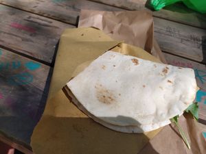 Piadina con farinata di ceci e spinaci, Mayo veg e rucola. Ottima, sostanziosa e a buon prezzo at Tika Tika in La Spezia