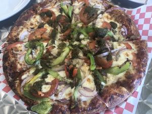 Our parents had the masala veggie vegetarian pizza  at Tasty Pizza in Cupertino