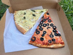 Slices to go  at Artistic Pizza in New York City