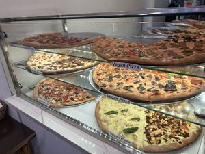 At least 14-15 different vegan pizza options  at Artistic Pizza in New York City