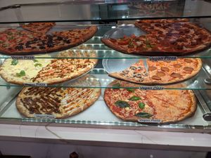 all slices are $4.99 at Artistic Pizza in New York City