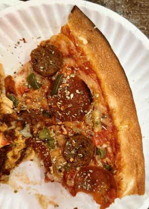 Sausage and pepperoni pie pizza  at Artistic Pizza in New York City