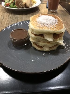 Vegan pancakes, with banana, chocolate and coconut at Fitagain in Krakow