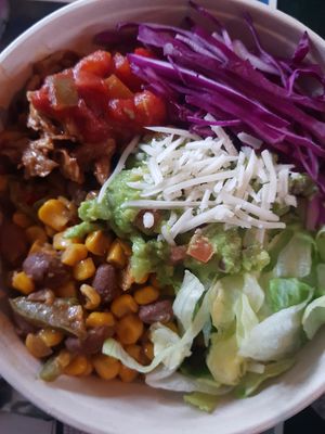 Burrito bowl - main course of a Mexican delivery menu at Ministerie van Geluk - Food Truck in Zoetermeer