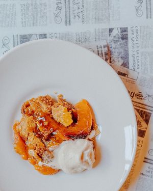 Burnt peach cobbler at Grass VBQ Joint - Cloud Kitchen in Decatur