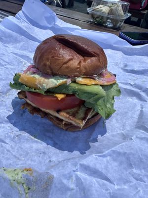 Lemon tofu and tempeh bacon sandwich with vegan cheddar, vegan aioli, and veggies. AMAZING!  at River Valley Co-op in Northampton