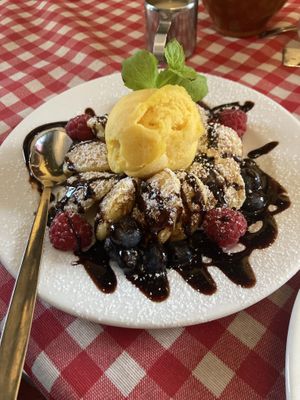 Poffertjes with blueberries, raspberries ad mango sorbett  at Det Lille Pannekakehuset in Lillehammer