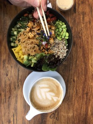 Large spicy tofu poke bowl and oat latte  at Leaves House || in Montreal
