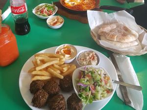 Mediterranean plate, papaya smoothie, shakshouka at Sabress Kosher Restaurant in Jaco