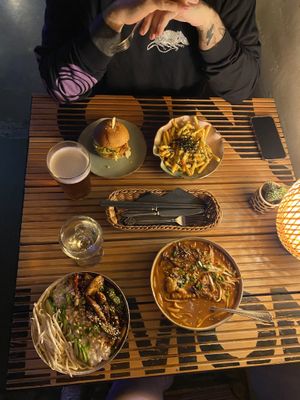 Chicken burger, asian fries, chicken sezchyan (or smt) and tomato asian soup.  at Bracka 20 in Warsaw