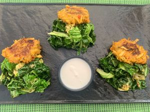 Potato and sweet corn patties with vegan mayo, served on cabbage  at Urban & Veggie in Dubrovnik