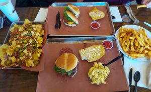 Nachos, two bacon cheeseburgers, mac and cheese, garlic bread and fries at Smokee Mo's St Louis BBQ in St Louis