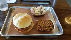 Jaxkfruit BBQ sandwich.  Vegan red potatoe salad and BBQ beans. at Smokee Mo's St Louis BBQ in St Louis