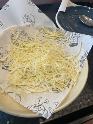 Uneaten vegan cheese after they didn’t melt it   at Balls and Bangles in Queenstown