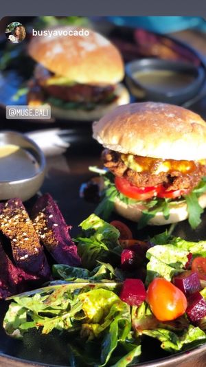 Vegan Burger. Jackfruit Chickpea Pattie. Served with Sweet Potato Wedges and Salad at Muse Cafe & Art in Ubud
