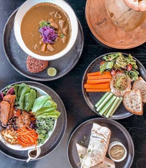 Salad, Dosa Gluten Free Wrap, Hummus, Avocado, Vegan Curry at Muse Cafe & Art in Ubud