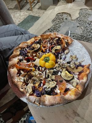 Vegan pizza without cheese and a lot of vegetables   at Pizza Yolo in Santa Catalina