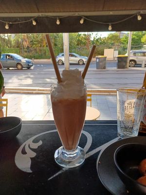 Chocolate cookie milkshake and outdoors seating view at Not Dog in Nice