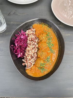 Lentils balls with brown rice in curry sauce  at Green Kukunari in Crete